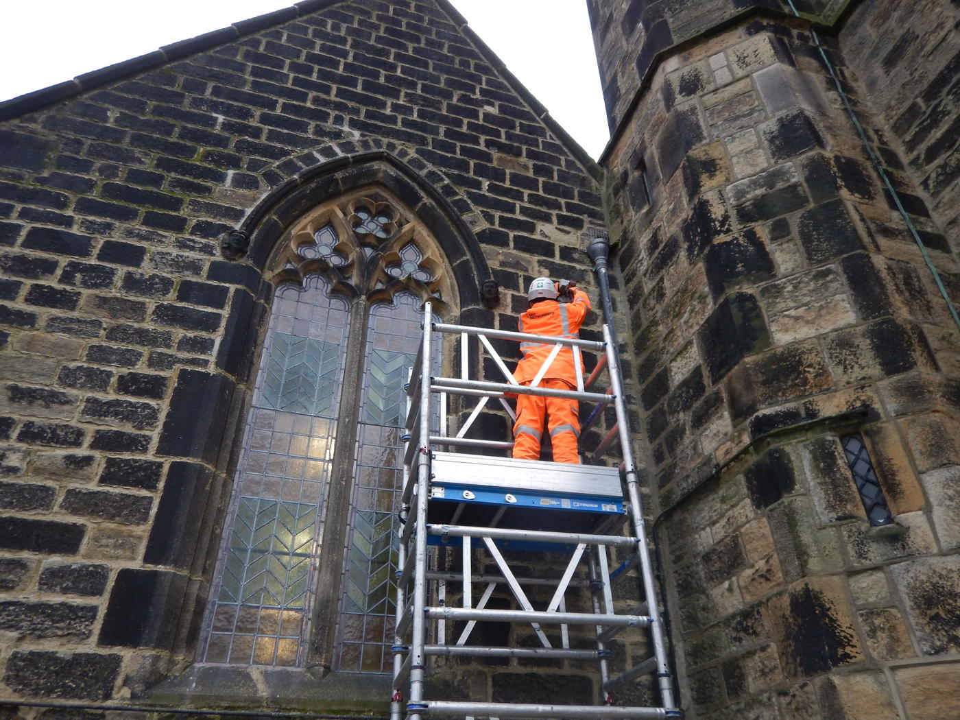 Engineer decommissioning Tiltmeter installed at height